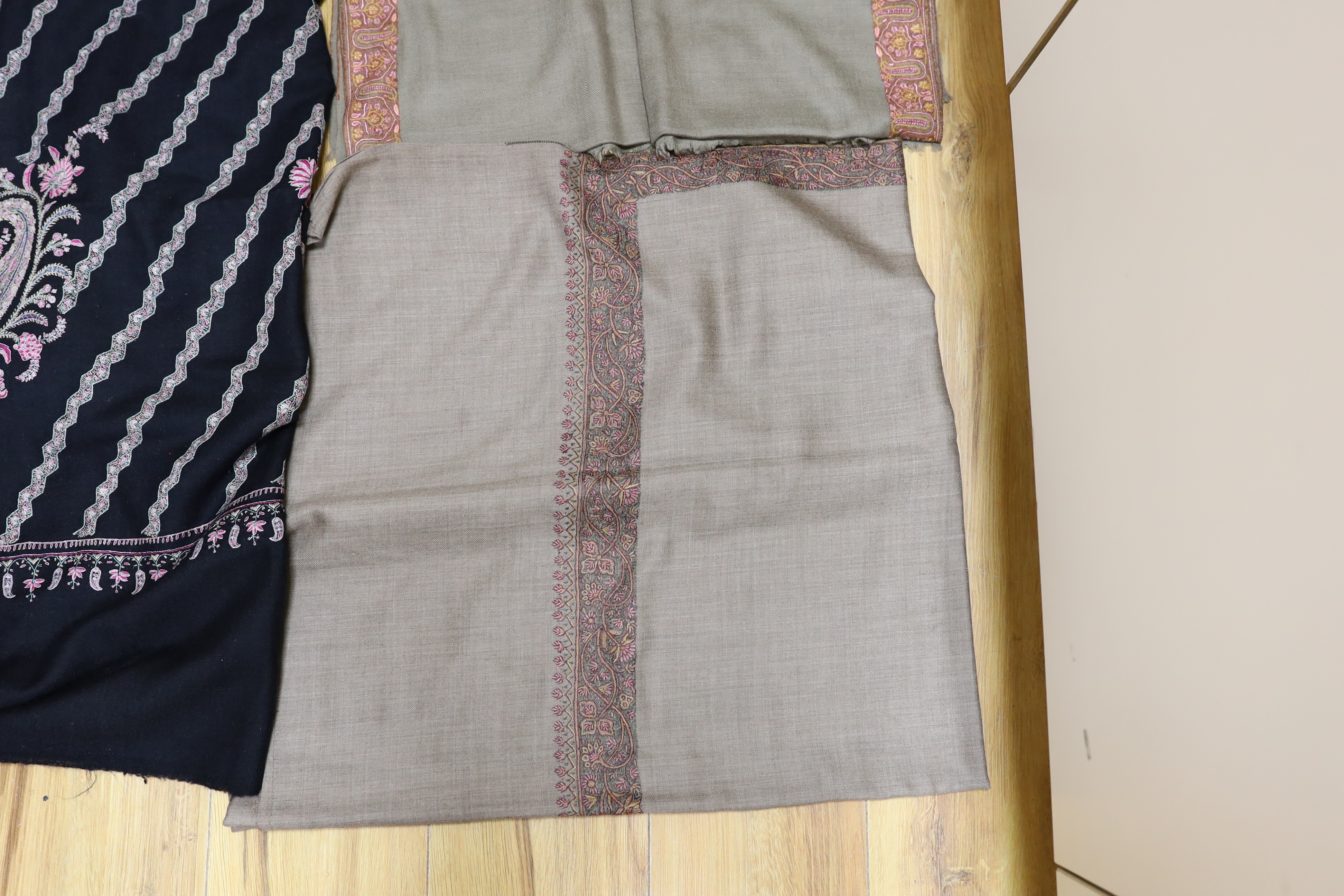 Four Indian wool and cashmere shawls, three silk embroidered